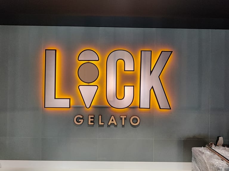 Read more about the article “Lick”:  Signage Installation Services
